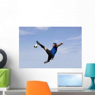 Football Soccer Player Volley Wall Decal shown on a wall