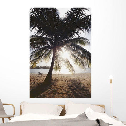View Of Ocean And Beach Through Palm Tree Wall Mural