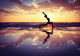 Silhouetted Woman Practicing Yoga on the Beach Wall Decal