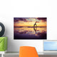 Silhouetted Woman Practicing Yoga at Sunset Wall Decal