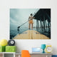 Surfer Paddles around Big Wall Decal