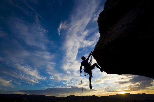 Rock Climber Dangling from Wall Decal