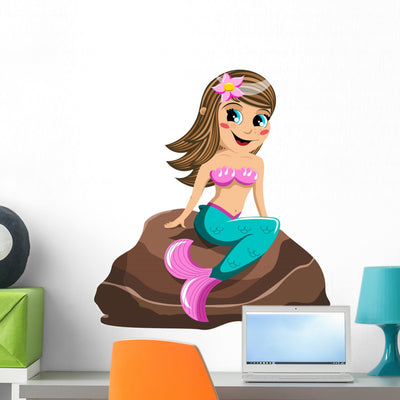 Little Mermaid Sitting Rock Wall Decal shown on a wall