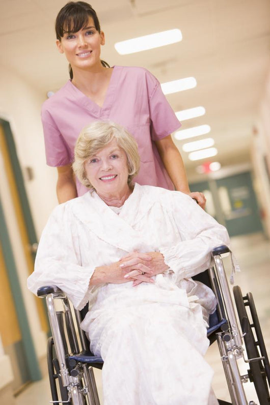 Nurse Pushing Senior Woman Wall Decal