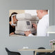 Male Ophthalmologist Conducting Eye Wall Decal