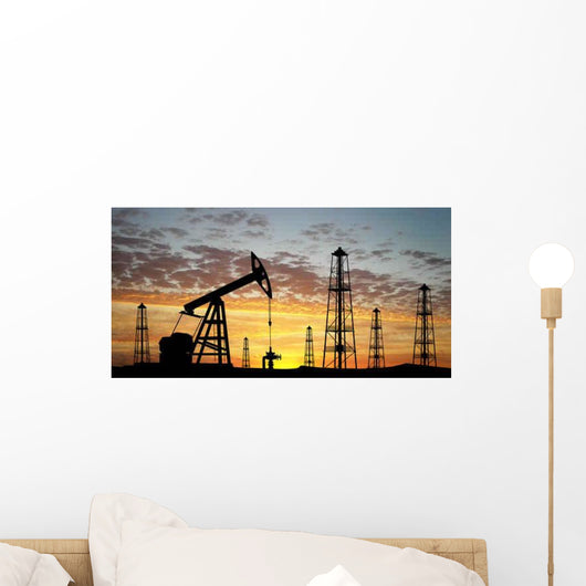 Three Pumps over Orange Sky Wall Mural