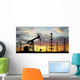 Three Pumps over Orange Sky Wall Mural