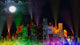 Modern City Lit by Colorful Light Effects at Night Wall Mural