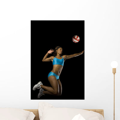 Volleyball Girl Wall Decal shown on a wall