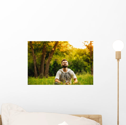 Man Sitting Grass Park Wall Decal