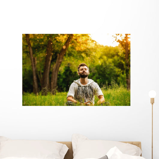 Man Sitting Grass Park Wall Decal