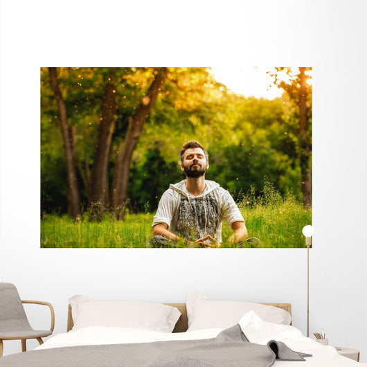 Man Sitting Grass Park Wall Decal