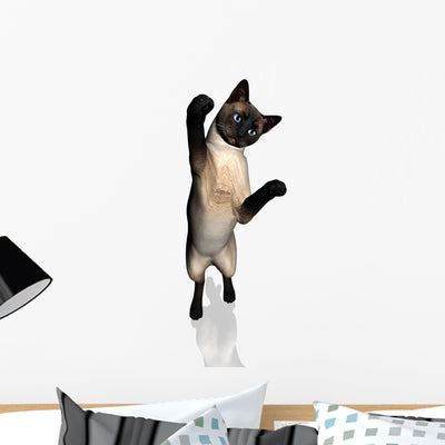Siamese Cat Jumping Wall Decal shown on a wall
