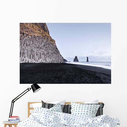 The black sand beach of Reynisfjara and the mount Reynisfjall fr Wall Mural