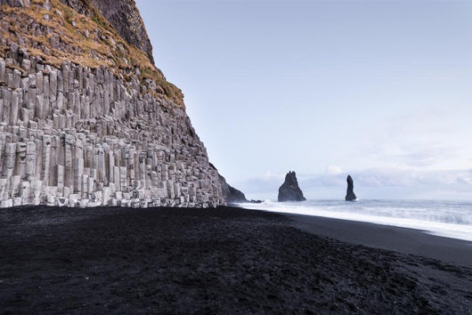 The black sand beach of Reynisfjara and the mount Reynisfjall fr Wall Mural