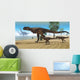 Carnotaurus Mother Brings Her Wall Decal