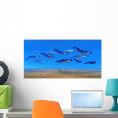 Pod Narwhal Whales Swim Wall Decal Design 2 shown on a wall