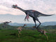 Gigantoraptor Surrounded Small Mononykus Wall Decal