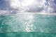 Sunlight Illuminates Turquoise Water Wall Decal
