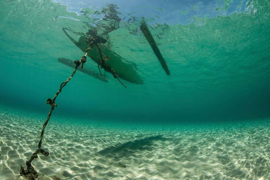 Wooden Outrigger Anchored near Wall Decal