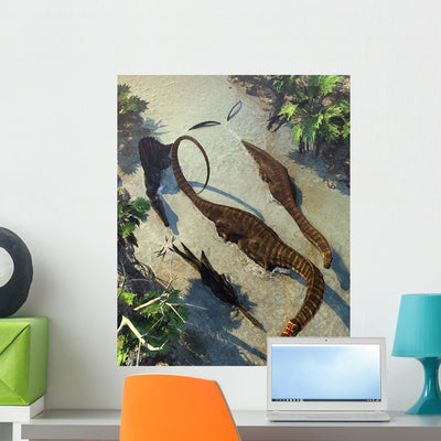 Apatosaurus Dinosaurs Being Chased Wall Decal shown on a wall