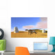Utahraptor Running across Grassy Wall Decal