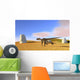 Utahraptor Running across Grassy Wall Decal