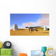 Utahraptor Running across Grassy Wall Decal