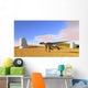 Utahraptor Running across Grassy Wall Decal