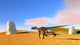 Utahraptor Running across Grassy Wall Decal