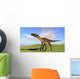 Utahraptor Walking across Grassy Wall Decal Design 1