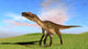 Utahraptor Walking across Grassy Wall Decal Design 1