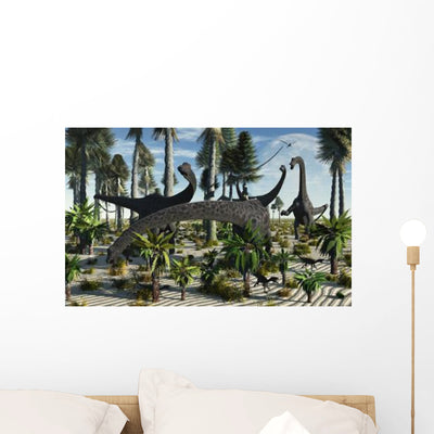Herd Diplodocus Dinosaurs Feeding Wall Decal shown on a wall