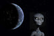 Grey Alien with Planet Wall Decal