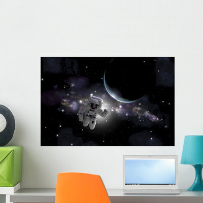 Artist's Concept Astronaut Floating Wall Decal shown on a wall