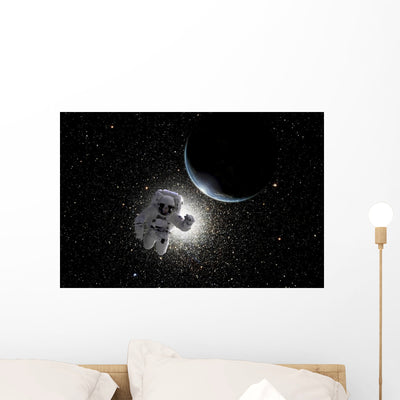 Astronaut Floating Deep Space Horizontal Wall Decal shown on a wall