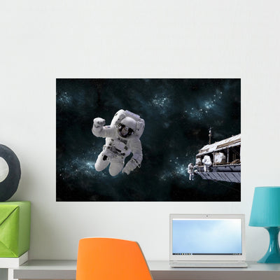 Galactic Scene Showing Astronauts Wall Decal shown on a wall