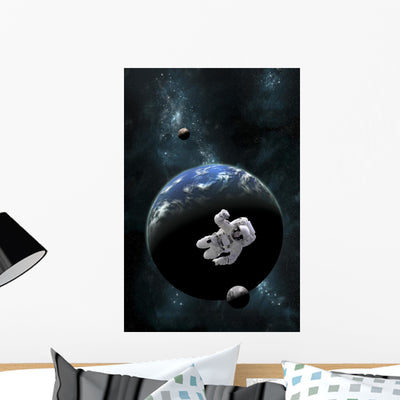 Astronaut Floating Front Water Wall Decal shown on a wall