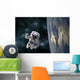 Astronaut Floating above Earth Horizontal Wall Decal