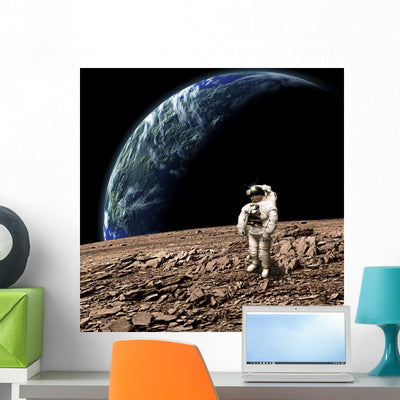 Astronaut Barren Rocky Planet Wall Decal shown on a wall