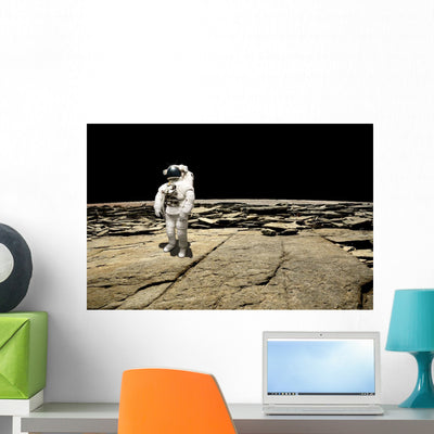 Astronaut Barren Planet Wall Decal shown on a wall