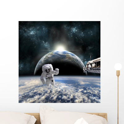 Astronauts Work Space Station Distant Planet Wall Decal shown on a wall