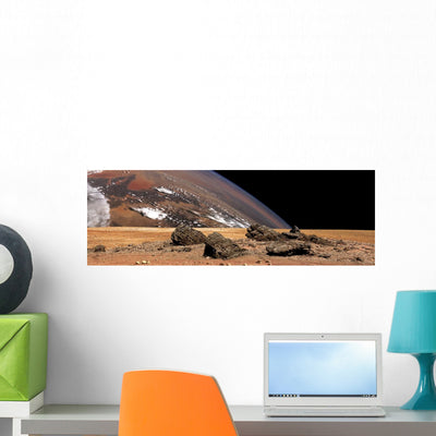 Large Planet Rises over Wall Decal shown on a wall