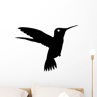 Hummingbird Flight Bird Silhouette Wall Decal shown on a wall