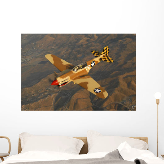 P-40 Warhawk Flying over Mountains Wall Decal