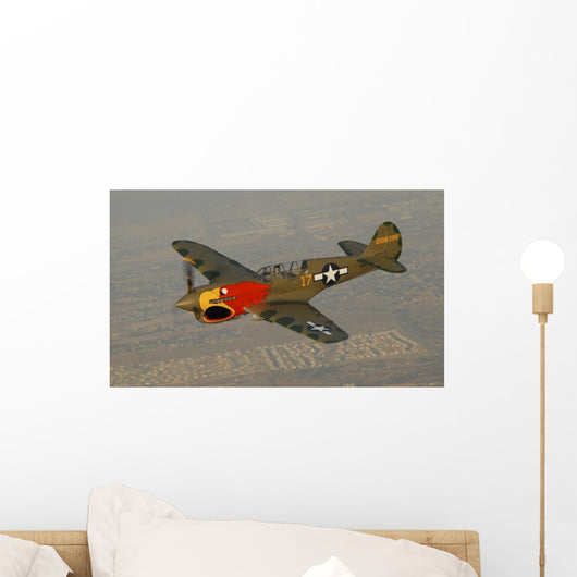 P-40 Warhawk Flying over Town Wall Decal