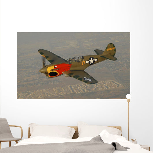 P-40 Warhawk Flying over Town Wall Decal