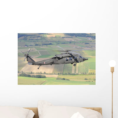 Uh-60 Black Hawk Helicopter In-Flight Wall Decal shown on a wall