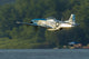 P-51 Mustang Flies Over Water Wall Decal