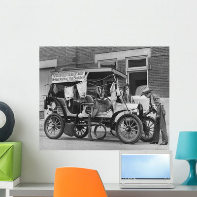 Person Donating Their Rubber Wall Decal shown on a wall